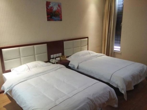 Imagen de la habitación del Hotel Super 8 Tengzhou Railway Station. Foto 2