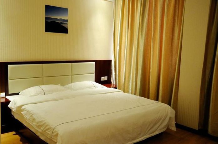 Imagen de la habitación del Hotel Super 8 Tengzhou Railway Station. Foto 6