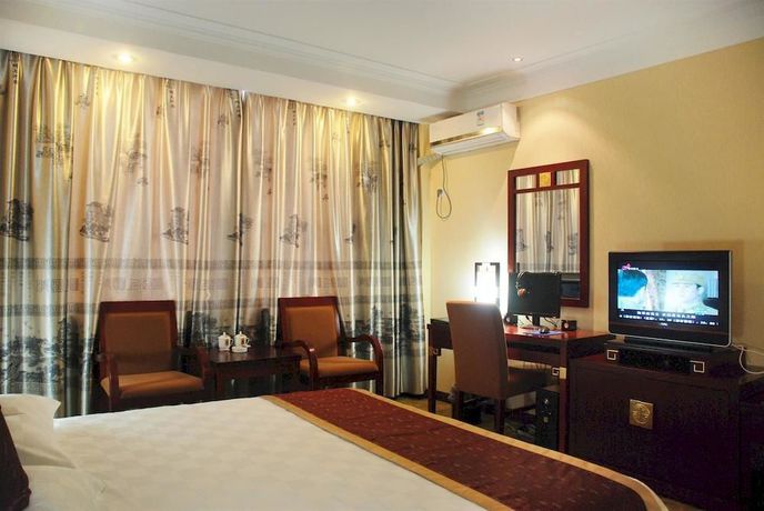 Imagen de la habitación del Hotel Super 8 Wuyuan Qian Shui Wan - Wuyuan. Foto 9