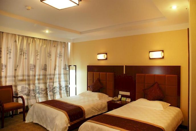 Imagen de la habitación del Hotel Super 8 Wuyuan Qian Shui Wan - Wuyuan. Foto 11