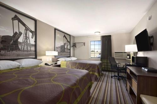 Imagen de la habitación del Hotel Super 8 by Wyndham Ardmore. Foto 5