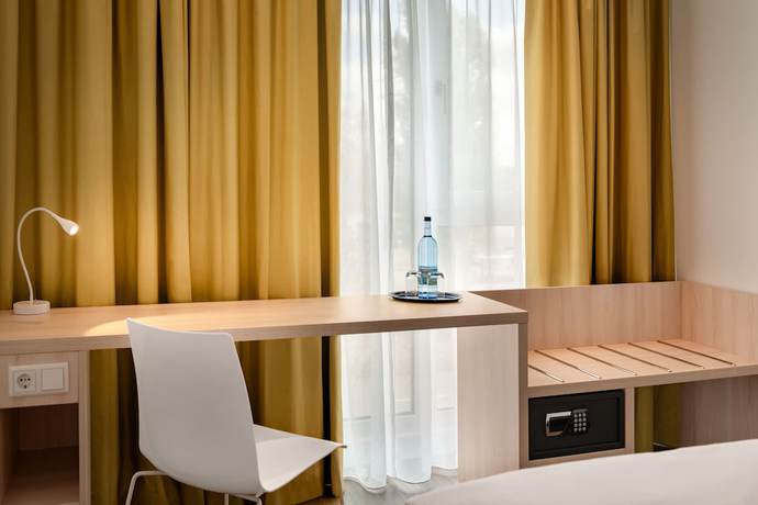 Imagen de la habitación del Hotel Super 8 by Wyndham Augsburg. Foto 7