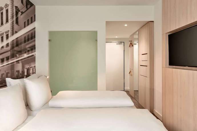 Imagen de la habitación del Hotel Super 8 by Wyndham Augsburg. Foto 8