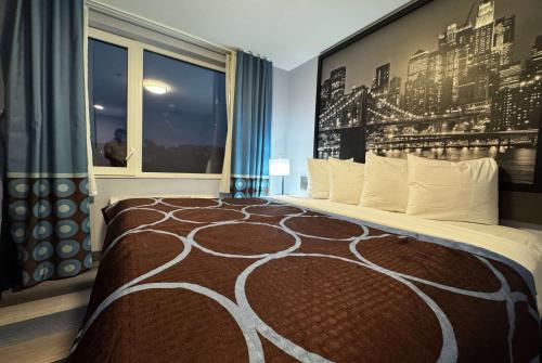 Imagen de la habitación del Hotel Super 8 by Wyndham Brooklyn Fulton Street/Broadway Junction. Foto 6