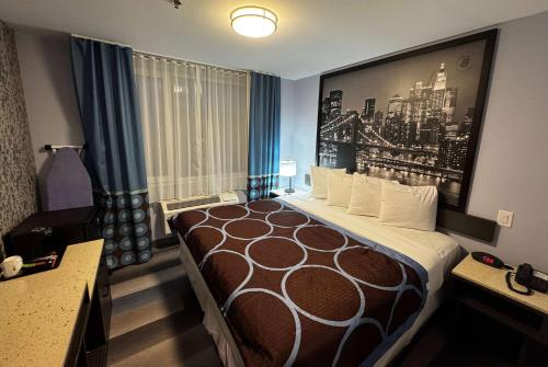 Imagen de la habitación del Hotel Super 8 by Wyndham Brooklyn Fulton Street/Broadway Junction. Foto 11