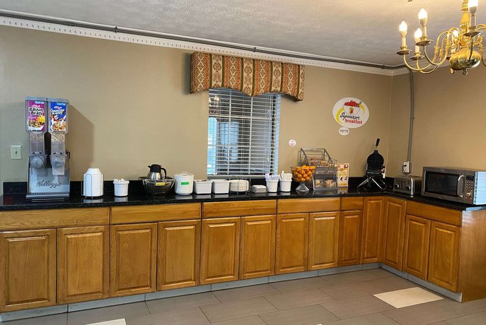 Imagen del bar/restaurante del Hotel Super 8 by Wyndham Covington, Covington. Foto 2