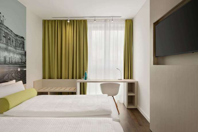 Imagen de la habitación del Hotel Super 8 by Wyndham Dresden. Foto 2