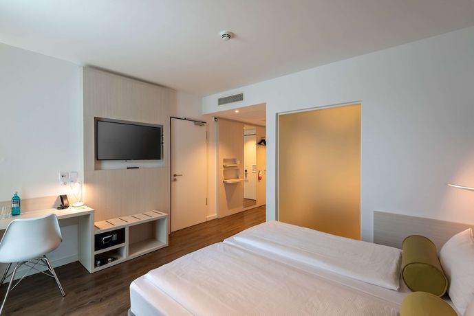 Imagen de la habitación del Hotel Super 8 by Wyndham Dresden. Foto 10