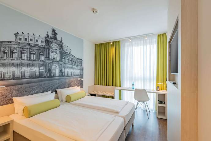 Imagen de la habitación del Hotel Super 8 by Wyndham Dresden. Foto 13