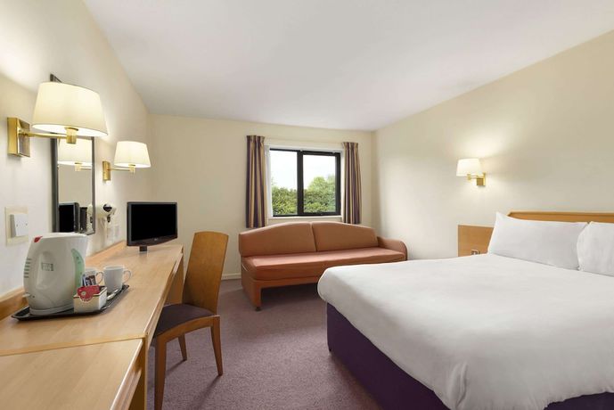 Imagen de la habitación del Hotel Super 8 by Wyndham Durham. Foto 7