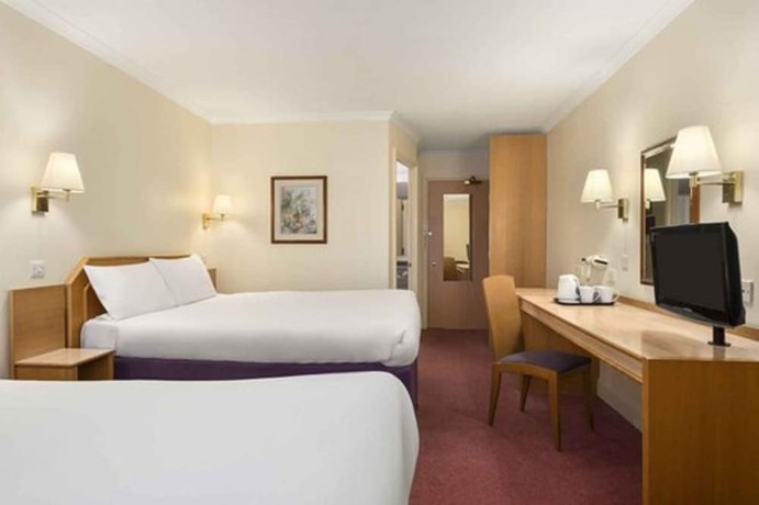 Imagen de la habitación del Hotel Super 8 by Wyndham Durham. Foto 9