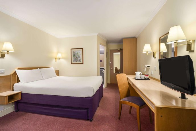 Imagen de la habitación del Hotel Super 8 by Wyndham Durham. Foto 12