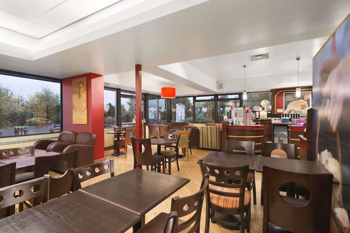 Imagen del bar/restaurante del Hotel Super 8 by Wyndham Durham. Foto 2