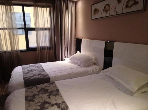Imagen de la habitación del Hotel Super 8 by Wyndham Fuzhou South Railway Station. Foto 2