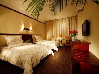 Imagen de la habitación del Hotel Super 8 by Wyndham Hankou Railway Station. Foto 2