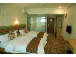 Imagen de la habitación del Hotel Super 8 by Wyndham Huizhou Bus Terminal. Foto 3