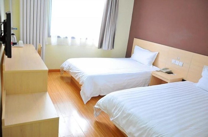 Imagen de la habitación del Hotel Super 8 by Wyndham Jinan Da Ming Hu Dong Men. Foto 3