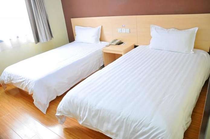 Imagen de la habitación del Hotel Super 8 by Wyndham Jinan Da Ming Hu Dong Men. Foto 6