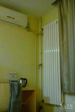Imagen de la habitación del Hotel Super 8 by Wyndham Jinan Da Ming Hu Dong Men. Foto 8