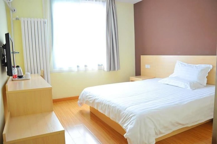 Imagen de la habitación del Hotel Super 8 by Wyndham Jinan Da Ming Hu Dong Men. Foto 15