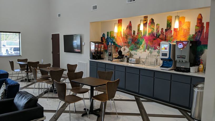 Imagen del bar/restaurante del Hotel Super 8 by Wyndham Kingwood Houston North. Foto 1