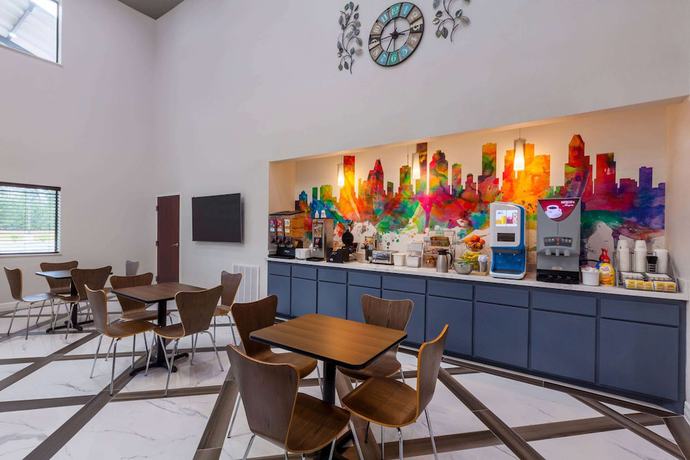 Imagen del bar/restaurante del Hotel Super 8 by Wyndham Kingwood Houston North. Foto 2