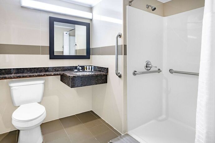 Imagen de la habitación del Hotel Super 8 by Wyndham Lindenhurst. Foto 12