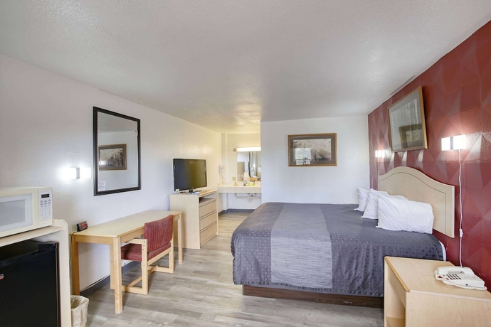 Imagen de la habitación del Hotel Super 8 by Wyndham Newcastle. Foto 4