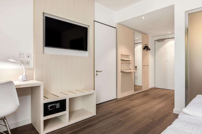 Imagen de la habitación del Hotel Super 8 by Wyndham Oberhausen. Foto 15