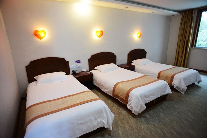 Imagen de la habitación del Hotel Super 8 by Wyndham Shanghai Pudong Airport ChenYangLu. Foto 7