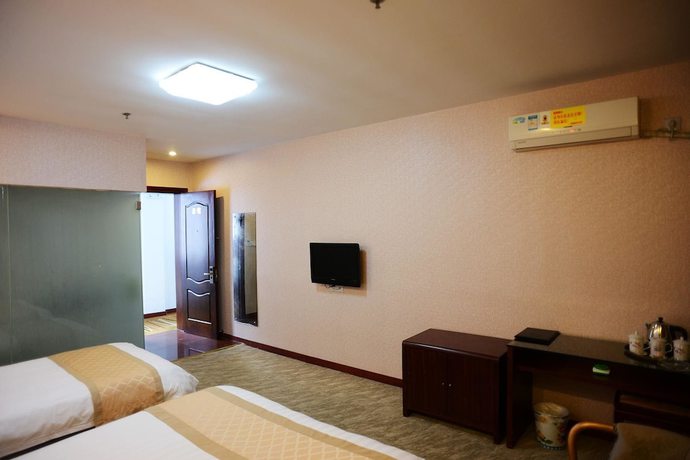 Imagen de la habitación del Hotel Super 8 by Wyndham Shanghai Pudong Airport ChenYangLu. Foto 8