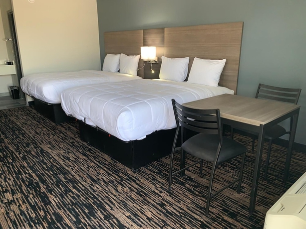 Imagen de la habitación del Hotel Super 8 by Wyndham Sulphur South. Foto 7