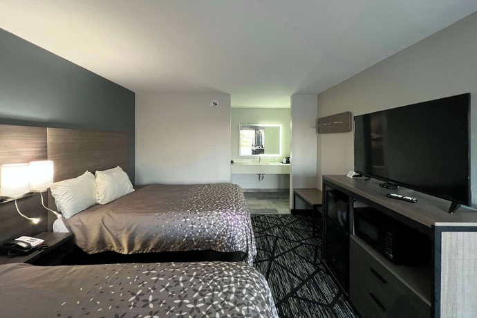 Imagen de la habitación del Hotel Super 8 by Wyndham Sulphur South. Foto 9