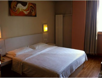 Imagen de la habitación del Hotel Super 8 by Wyndham Tiajin Chang Jiang Dao. Foto 3