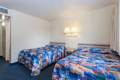 Imagen de la habitación del Hotel Super 8 by Wyndham Turlock. Foto 3