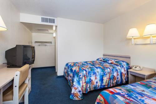 Imagen de la habitación del Hotel Super 8 by Wyndham Turlock. Foto 12
