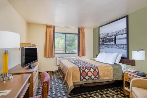 Imagen de la habitación del Hotel Super 8 by Wyndham Wheeling. Foto 6