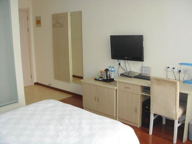 Imagen de los interiores del Hotel Super 8 by Wyndham Yizheng Shi Dai Guang Chang. Foto 12