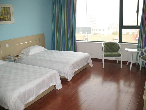 Imagen de la habitación del Hotel Super 8 by Wyndham Yizheng Shi Dai Guang Chang. Foto 7