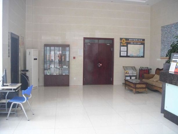 Imagen de los exteriores del Hotel Super 8 by Wyndham Yizheng Shi Dai Guang Chang. Foto 10