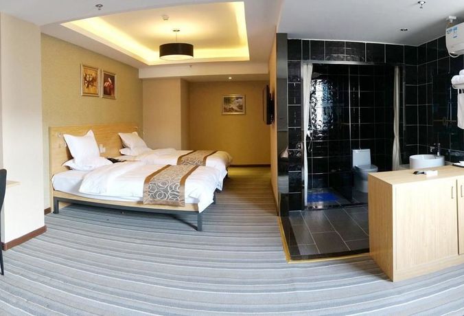 Imagen de la habitación del Hotel Super 8 by Wyndham Zhengzhou Railway Station. Foto 2