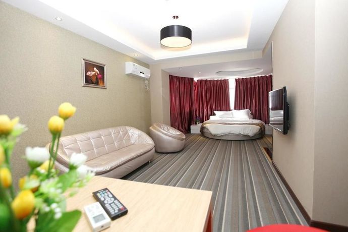 Imagen de la habitación del Hotel Super 8 by Wyndham Zhengzhou Railway Station. Foto 5