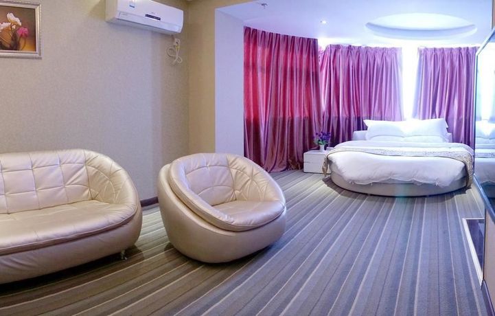 Imagen de la habitación del Hotel Super 8 by Wyndham Zhengzhou Railway Station. Foto 7