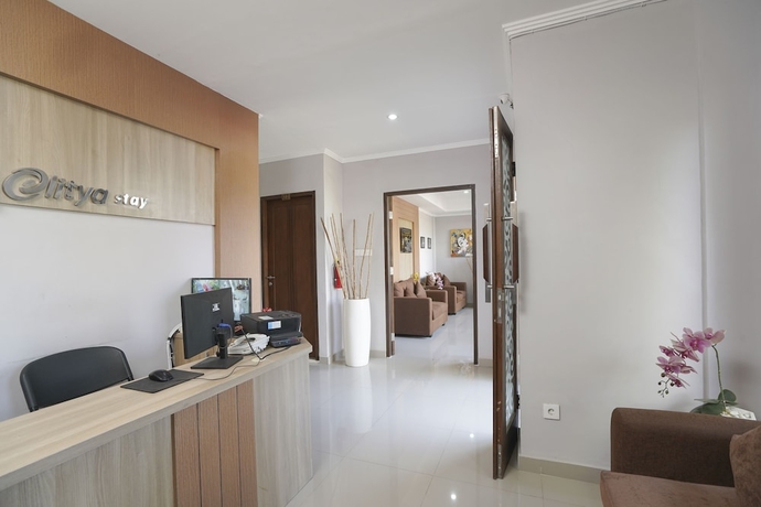 Imagen de los interiores del Hotel Super Capital O 2166 Elitya Stay. Foto 11