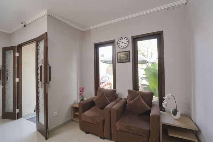 Imagen de los interiores del Hotel Super Capital O 2166 Elitya Stay. Foto 13