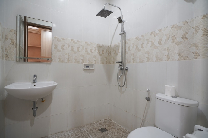 Imagen de la habitación del Hotel Super Capital O 2166 Elitya Stay. Foto 9