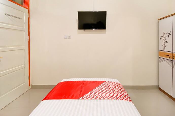 Imagen de la habitación del Hotel Super Capital O 3092 Falah Residence Syariah. Foto 15