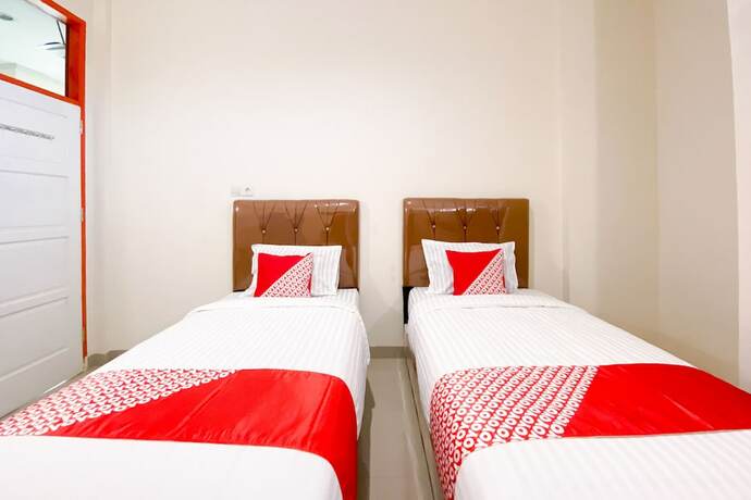 Imagen de la habitación del Hotel Super Capital O 3092 Falah Residence Syariah. Foto 17