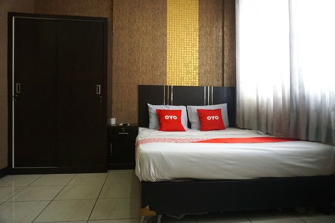 Imagen de la habitación del Hotel Super Capital O 3952 C 18 Cibaduyut. Foto 15