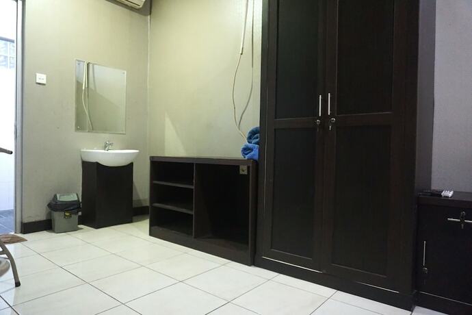Imagen de la habitación del Hotel Super Capital O 3952 C 18 Cibaduyut. Foto 17